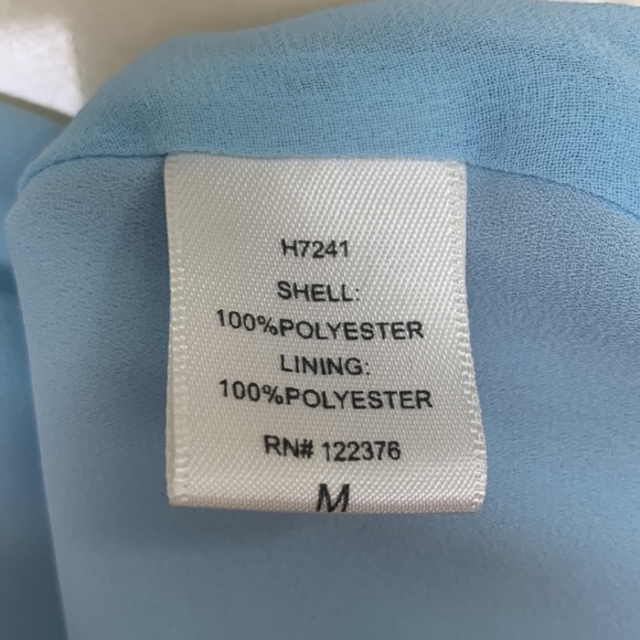 SOLD Not For Sale
3 for $20 - Sleeveless shell - Picture 3 of 5